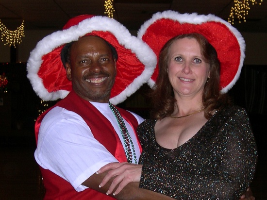 Art and Denyse in their holiday hats (1)