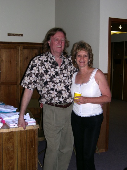 The June SSNM Party - Larry and Dawn greeting people at the door