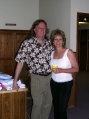 The June SSNM Party - Larry and Dawn greeting people at the door